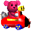 Pink bear in red vehicle with yellow accents and blue wheels, showing sequential motion