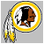 Pixelated icon of a Native American figure in profile, wearing a feathered headdress with white and yellow feathers, set against a gray background.
