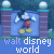 Mickey Mouse in red shorts and yellow shoes stands behind a blue gate with brick pillars, text below reads "walt disney world" on a blue background.