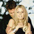 A 50x50 pixel animated buddy icon featuring a couple embracing on the left and green text "Original Icons .com" on the right, displayed as a contact sheet with two frames.