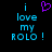 Pixelated text reads "i love my ROLO!" in cyan with a purple heart symbol above the 'i' on black background.