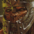 A 50x50 pixel animated buddy icon featuring a medieval knight's helmet on the left and green text reading "Original Icons .com" on the right, displayed as a contact sheet with two frames.