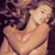 Static pixelated image of two figures in close physical contact with visible skin tones and partial clothing, rendered at low resolution.