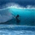 Pixelated static image of a surfer riding a wave in blue and turquoise tones with dark silhouette against water background.