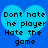 Two identical pixelated heart-shaped icons with blue background and black text reading "Dont hate he player Hate the game".