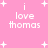 Pink background with white pixelated text 'i love thomas' and scattered plus signs, animated to shift positions.
