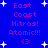 Blue background with white starbursts and pink text reading East Coast Nitros! Atomic!!! <3 repeated in a pattern