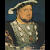 Pixelated figure in armor with a hat, standing against a dark background.