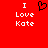 Red background with white text "I Love Kate" and a black pixelated heart symbol centered above the word "Love".
