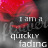 Pixelated image with red and gray gradient background, white text reading 'I am a quicky fading' in three lines.