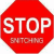 Red octagonal stop sign icon with white text "STOP" and partially obscured lower text, pixelated rendering on transparent background.