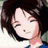 Pixelated static image of a character with dark hair and light skin, wearing a blue top against a white background.