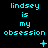 Cyan text on black background reads "lindsey is my obsession" with varying symbols below each phrase.