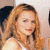 A static image shows a woman with long wavy blonde hair and red lipstick on the left, next to green text reading 'Original Icons .com' on a dark green background.