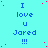A static digital image with a light blue background displaying repeated text "I love u Jared !!!" in dark blue pixelated font, scattered red dots, and a gray rectangle at the bottom right.