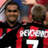 Static 48x48 pixel icon showing two soccer players in red and black uniforms with visible text "COOL" and number "7" on the field, rendered at low resolution with dithering effects.