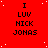 Red background with white dots, repeated text "I LUV NICK JONAS" in black pixelated font