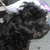 A pixelated image shows a dark, textured object on the left and purple text reading 'babyyyy<3' on a brown background.