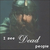 A split-screen animation shows a bearded figure in dark clothing on the left and a greenish, blurry background on the right with text reading "I see Dead people".