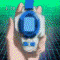 Animated sequence showing a character with red hair in a ponytail holding a blue and white device, with green and blue energy effects and multiple poses.
