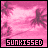 Pixelated pink beach scene with palm trees and a figure, text 'SUNKISSED' at bottom.