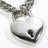 A heart-shaped pendant on a chain with pink text reading 'Kaydie, Jordan, Ashley!!! Best Friends.. FOREVER' on a cyan background.