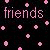 Pixelated text and colored dots on a black background, with four distinct sections of words and symbols in pink, green, purple, and cyan.