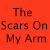 Red background with black text reading 'The Scars On My Arm Will Last For Months But The Scars You Left On My Heart Will Last Forever' across three , two of which are partially obscured by colored rectangles