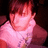 Pixelated image of a person with brown hair and pink clothing on left, teal background with white pixelated text reading "Don't believe that it's better when you leave everything behind".