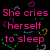 Pink text on black background with colorful heart shapes, displaying lyrics about a girl crying herself to sleep.
