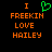 A pixelated image with orange text and a green heart symbol on black background, showing two side-by-side versions of the same design.