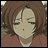 Pixelated anime-style character with brown hair and closed eyes, wearing a red top against a blurred background, next to text reading "AnimeIM" and "com" on black.