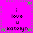 Bright pink background with green pixelated border and crosshatch patterns, displaying repeated text "i love u katelyn" in black block letters.