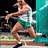 Pixelated image of a person in mid-action, wearing green and white clothing with brown accents, holding an object near their face against a dark background.