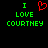 Green pixelated text "I LOVE COURTNEY" with a red heart symbol replacing the word "LOVE" on black background.