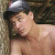 A 2x2 contact sheet of a pixelated animated icon featuring a shirtless man in a cap with text elements arranged around the image.