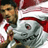 Static 48x48 pixel icon of a soccer player in motion, wearing white and red uniform with visible facial features and partial body pose against blurred background.
