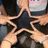 A star-shaped icon with a black center and beige arms, surrounded by red text reading "LOVE" and "ROCK & ROLL!!!!!" on a black background.