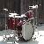 Static pixelated image of a drum kit with visible cymbals and drums against a dark background, rendered in low resolution with heavy dithering and color bleeding.