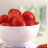 Animated sequence showing a bowl of tomatoes, an ampersand symbol, spaghetti strands, two horizontal lines, and a plate of spaghetti with red sauce.