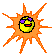 Yellow circular face with purple sunglasses and red mouth inside orange sunburst, on gray background.