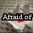 A four- displays text fragments over a textured background with a red accent, forming the phrase "Afraid of being broken" with a broken heart symbol