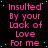 A static digital image displays repeated text in pink and blue on a black background with scattered cyan dots.
