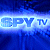 Pixelated blue and white static image featuring the text "SPY TV" in blocky letters against a gradient background with horizontal light streaks.