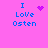 Pixelated text 'I Love Osten' on pink background with animated heart and starburst symbols replacing static icons.