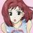 A pixelated anime-style character with red hair and a light blue top on the left, next to black background text reading "Anime IM" and "COM" on the right.