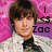 Pixelated image of a person with brown hair wearing a white and black top against a pink and purple background with text elements.