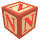 16 identical red and beige letter blocks with a large red 'N' on each visible face, arranged in four and four against a gray background