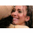 pixelated text icons with turquoise and magenta lettering, pink stars scattered around, and two small blurred celebrity photos in the top-left corner