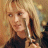 A 48x48 pixel animated buddy icon featuring a split composition with a blonde woman on the left and "KILL BILL VOL.1" text on the right, rendered in low-resolution pixel art style.